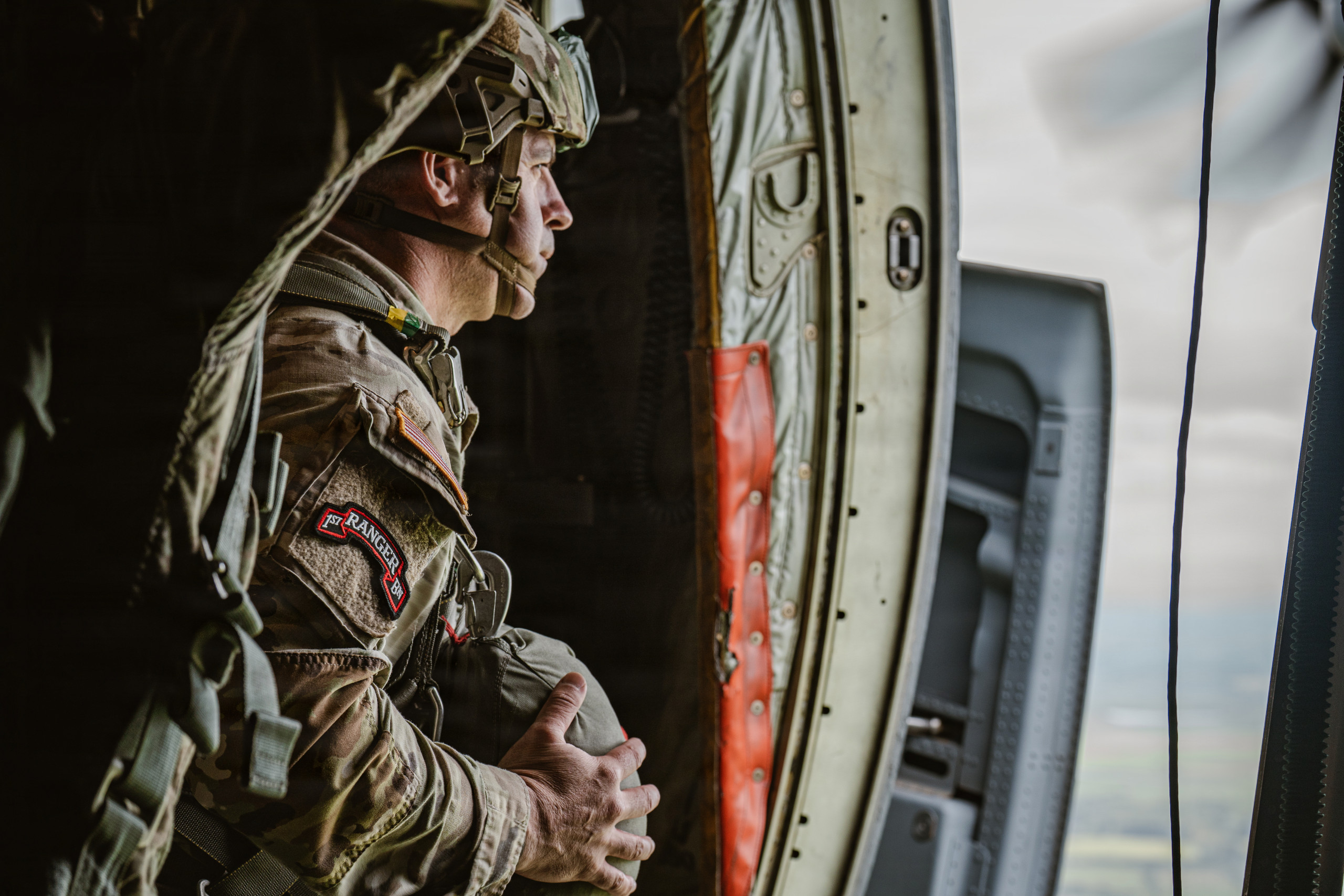 U.S. and Allied Paratroopers jump into Iron Mike drop zone for D-Day 82 C-130 paratroop door